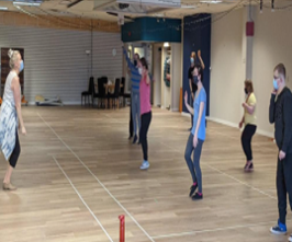 Group of Adults Dancing - Building Confidence Through Dance Wellness Grant